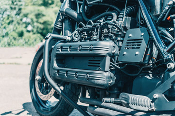 Wall Mural - Motorbike part, close up. Motorcycle engine, toned