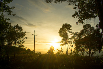 Wall Mural - the longitudinal mountains and the setting sun and the forest on doi tung