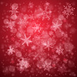 © Olga Moonlight - Christmas background of complex blurred and clear falling snowflakes in red colors with bokeh effect