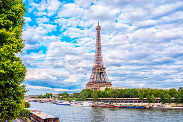 Poster - View of Eiffel Tower from the Seine river in Paris at summer evening, France