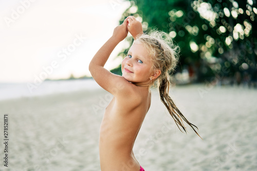 Cute Little Girl Dancing On Tropical Beach Stock Photo Adobe Stock