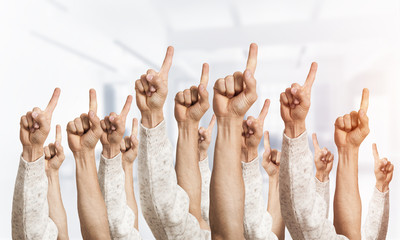 Wall Mural - Row of man hands showing finger pointing gesture