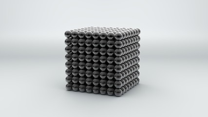 3D rendering of a neocube, a geometric figure consisting of many chrome-plated magnetic metal balls. Neocube on white surface, insulated. Futuristic abstract 3D design. 3D rendering.