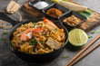 © poomsak - Home Made Pad thai with Shrimp and Vegetables on Marble table