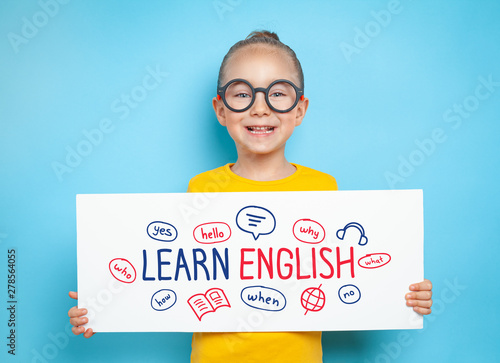 beautiful cute little girl holding a white paper with message Canvas Print