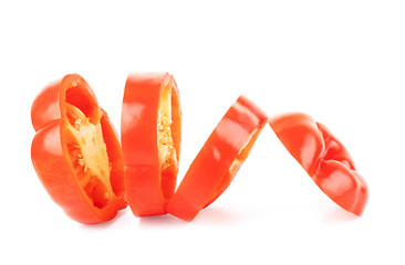 Wall Mural - Red bell pepper sliced on a white background