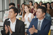 © linghaa - Young Asian people audiences seminar group smile and applaud to the speaker in meeting room. seminar and training concept.