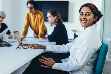 Wall Mural - Businesswoman during a boardroom meeting