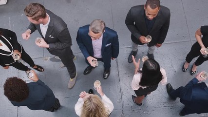 Wall Mural - Overhead Shot Of Business Team Socializing With Drinks At After Work Meeting In Modern Office