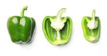 Whole And Cut Green Bell Peppers On White Background, Top View