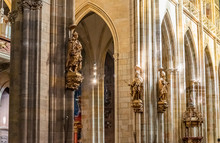 Statues Decorating Pillars Inside Ancient European Gothic Cathedral