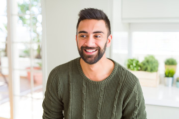 Wall Mural - Handsome man smiling cheerful with a big smile on face showing teeth, positive and happy expression