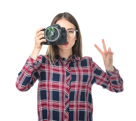 Wall Mural - Young female photographer on white background