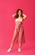 © Pixel-Shot - Happy young woman on color background
