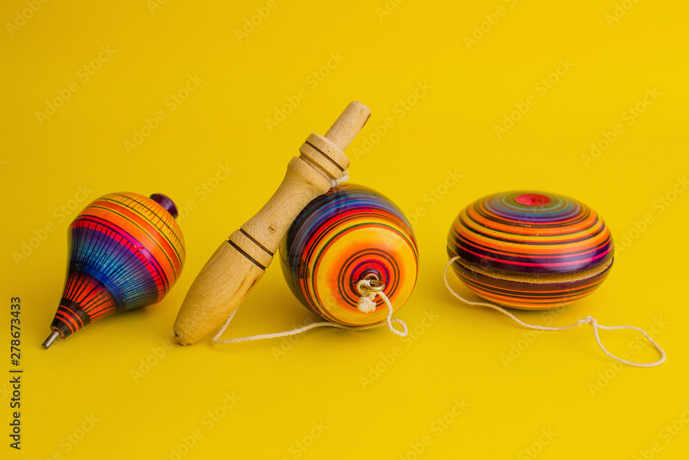 mexican toys from Wooden, balero, yoyo and trompo in Mexico on a 