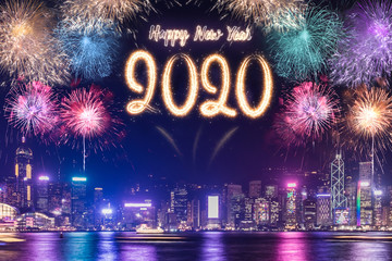 Wall Mural - Happy new year 2020 firework over cityscape building near sea at night time celebration,mock up Banner for advertise on social media.