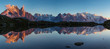 Panorama of the Mont Blanc massif reflected in Lac de Chesery during sunset. Chamonix, France.