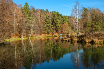 Autumn forest river water panorama. Natural color.