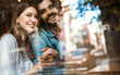 © NDABCREATIVITY - Happy couple hugging at bar and having date