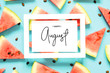 Inscription Happy August. Fresh red watermelon slice Isolated light blue background. Top view, Flat lay. - Image