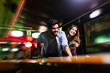 © NDABCREATIVITY - Happy young man playing snooker with his girlfriend. Happy loving couple.