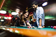 © NDABCREATIVITY - Happy young man playing snooker with his girlfriend. Happy loving couple.