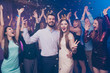 © deagreez - Portrait of astonished people screaming lovers become king queen holiday hug embrace wear dress formal wear suit disco discotheque