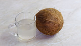 Fototapeta Sport - coconut and glass with coconut milk