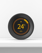 Smart thermostat on a white stand against a white wall. 3d render. Front view. Smart Home Series.