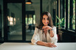 © bnenin - Portrait of a elegant positive businesswoman at modern office.