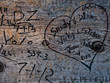 © Carlos Gama Photo - wood bank marked with names, dates and a heart