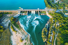 Aerial Panoramic View Of Concrete Dam At Reservoir With Flowing Water, Hydroelectricity Power Station, Drone Shot