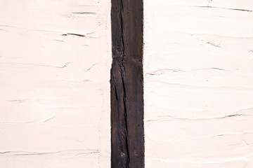 Wooden line divides in two piece painted texture with brush and palette knife strokes.