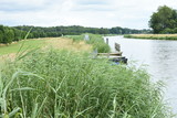 rowing boats at a quay in river Oude IJssel in the Achterhoek
