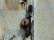 Lock on an old rusty iron door.