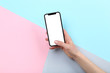 © 5second - Smartphone in female hand on colorful background