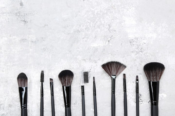 Canvas Print - Set of makeup brushes on grey background