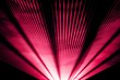 Red laser show nightlife club stage and shining sparkling rays. Luxury entertainment in nightclub event, festival, concert or New Years Eve. Ray beams are symbol for science and universe research