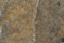 Rusty Background. The Surface Of The Marble With A Brown Tint. Grunge Abstract Stone.