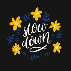 Wall Mural - Slow down. Inspirational quote, handwritten calligraphy in pink floral frame for diary, journal or poster design. Slow life slogan.
