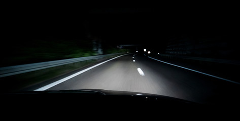 Driver POV at the dark highway driving fast in France