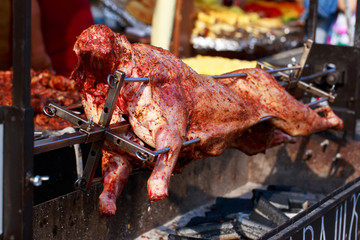 Grilled sheep carcass on a spit