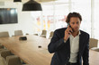 © WavebreakMediaMicro - Businessman talking on mobile phone in the conference room