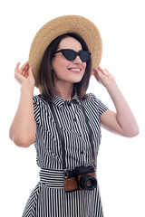 Wall Mural - portrait of young beautiful woman tourist in straw hat with camera isolated on white