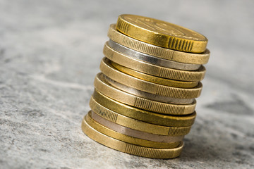 Various coins in a vertical column