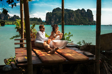 Couple on their honeymoon. Couple travels the world. Happy couple on vacation. Man and woman traveling to Thailand. Holidays on beautiful Islands. Tourists on vacation. Trip to the islands