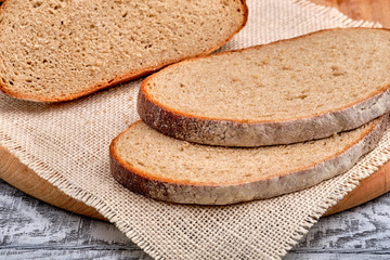 Fresh sliced bread on cutting board