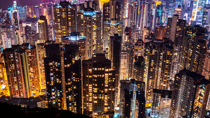 Wall Mural - High view of Hong Kong skyline cityscape night light over Victoria harbour at Victoria Peak