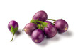 Group of baby purple eggplants on white background