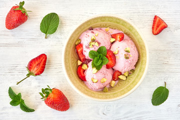 Poster - Strawberry ice cream , frozen yogurt with fresh strawberries and mint leaves. Top view